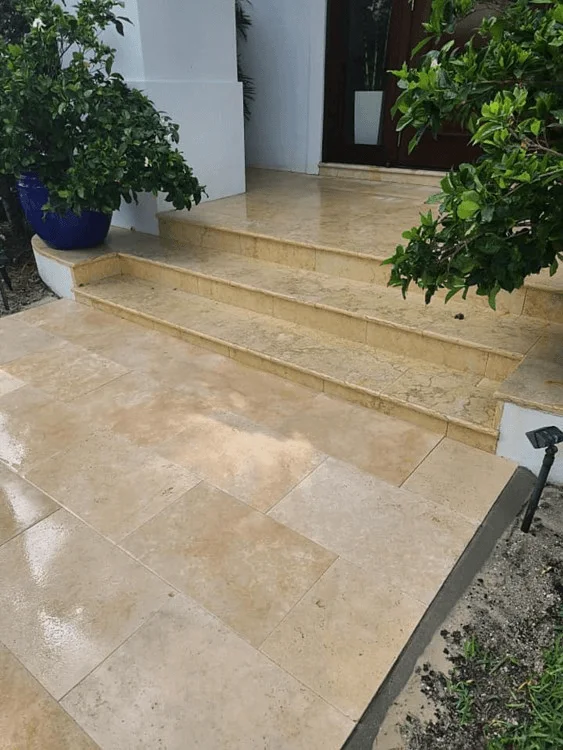 Shiny stone patio pavers on stairs done by contractors in Palm Beach County, Florida
